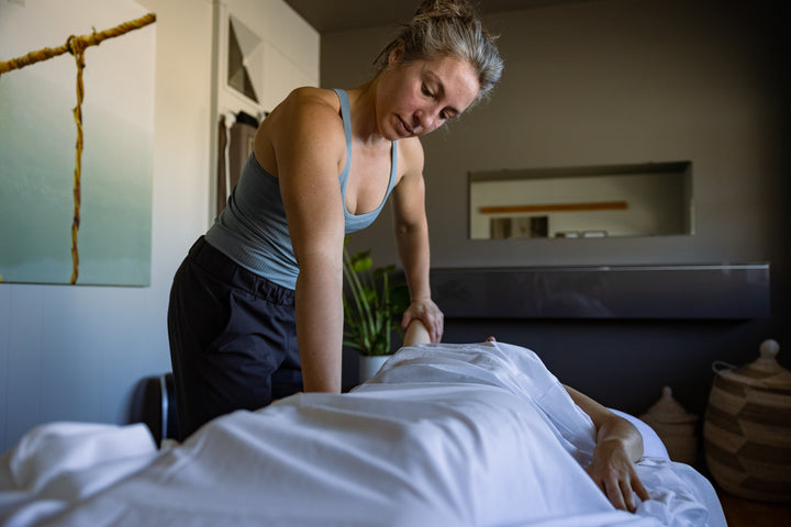 Jessa Munion works with a massage therapy client at Rocksteady Bodyworks in Holladay, Utah